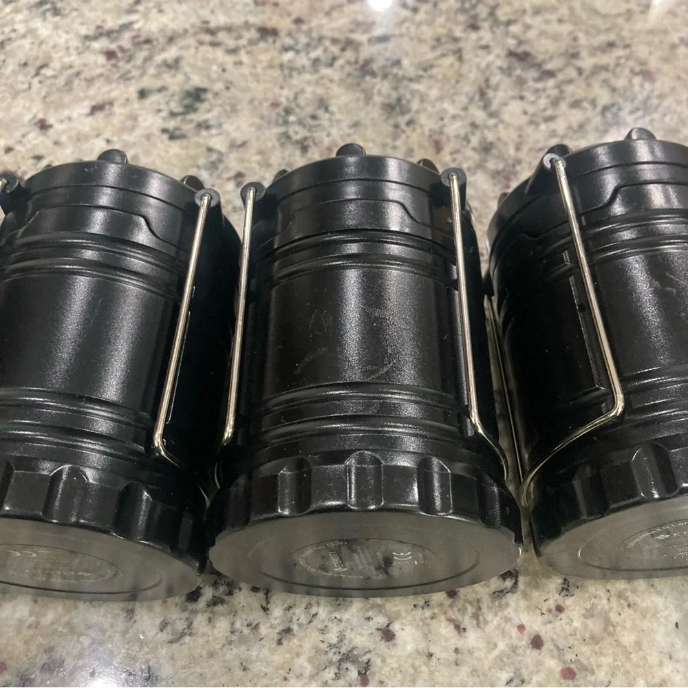 Set of 4 Etekcity black LED travel/camping lanterns Preowned **No Batteries**
